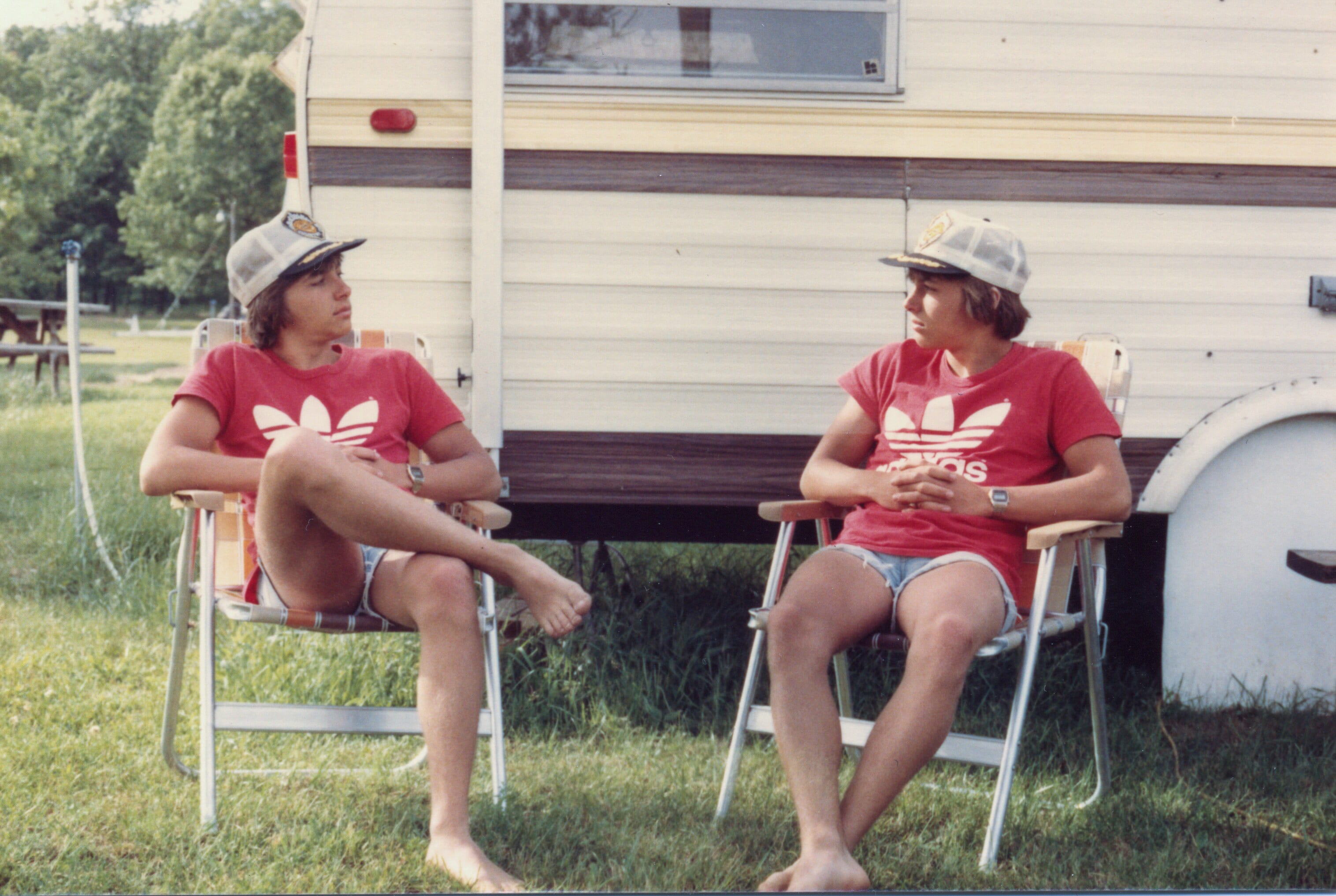 Double exposure of man sitting in chair(s)