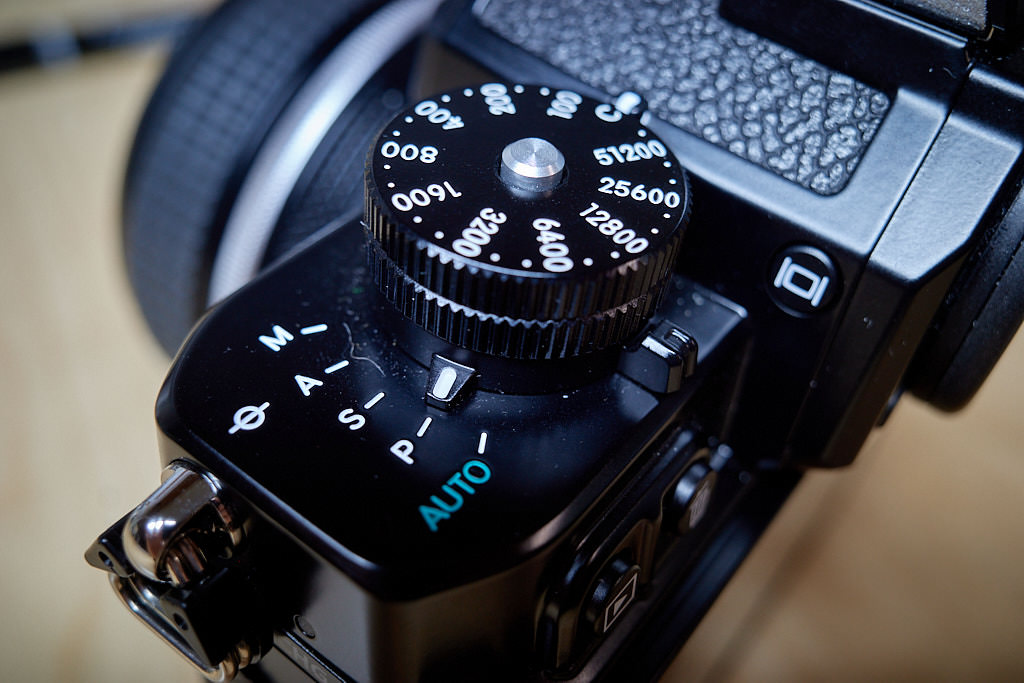 Closeup of mode selector in the Nikon Z f camera